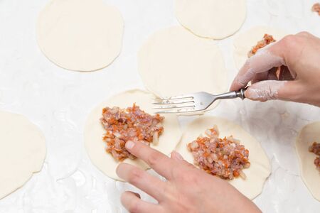 cooking dumplings from doughの写真素材