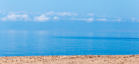 sandy shore of the sea as a backdropの写真素材