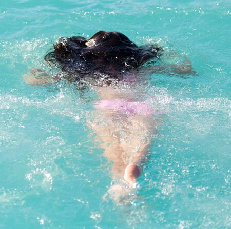 girl bathes in the water park