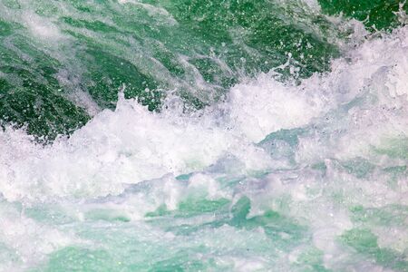 stormy waters of the river as a backdropの写真素材
