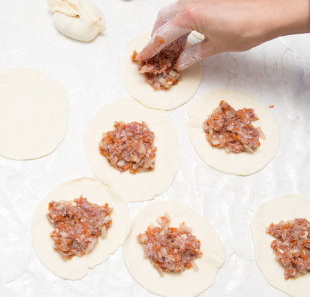 cooking dumplings from doughの写真素材