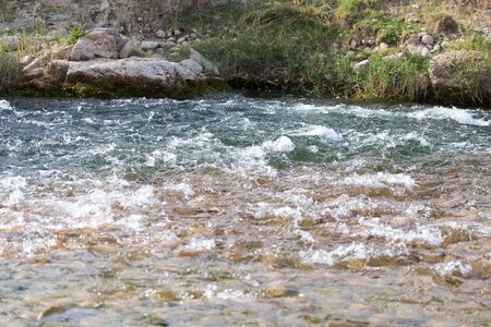 mountain river with stones