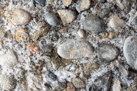 ice on the stone ground as a backgroundの写真素材