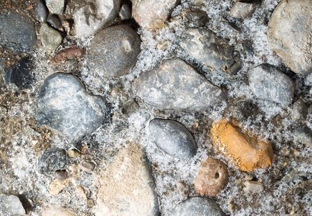ice on the stone ground as a background