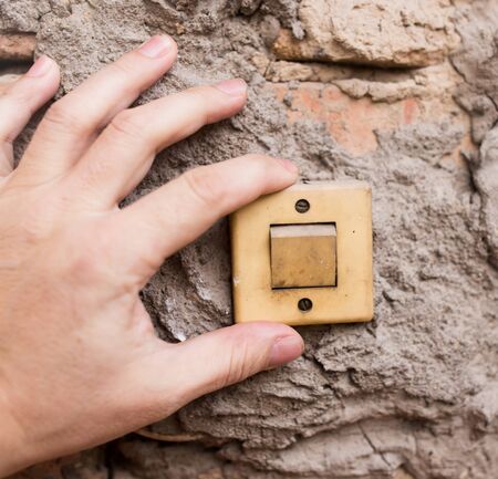 hand on the old switchの写真素材