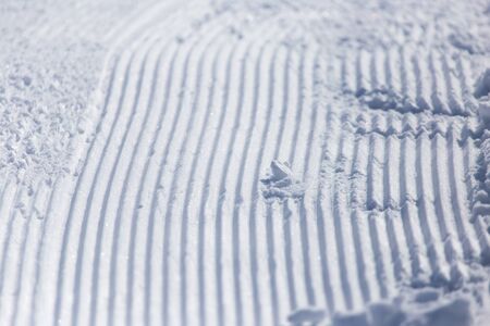 stripes on snow in the winter as the backgroundの写真素材
