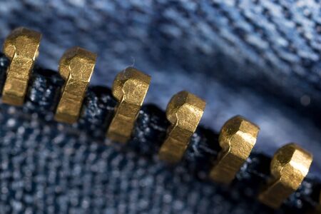 zipper on jeans as a background. macroの写真素材