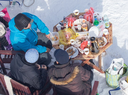 Shymkent, KAZAKHSTAN - February 5, 2017: a picnic on the ski resort Tausamalyのeditorial素材