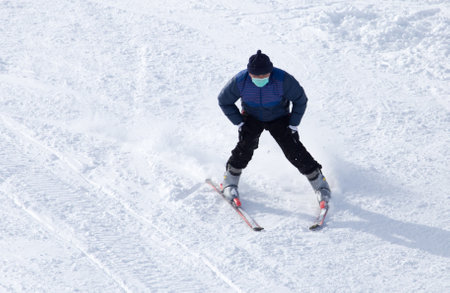 Shymkent, KAZAKHSTAN - February 5, 2017: A man skiing on ski resort Tausamalyのeditorial素材