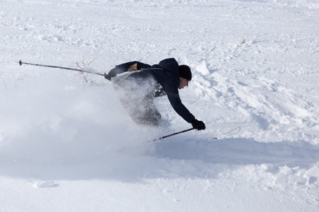 Shymkent, KAZAKHSTAN - February 5, 2017: A man skiing on ski resort Tausamalyのeditorial素材