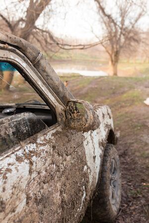 dirt on the cars SUV