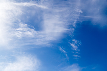 clouds in the blue sky as background