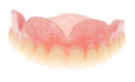 false teeth on a white background