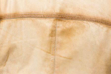 Light skin on the jacket as a backgroundの写真素材