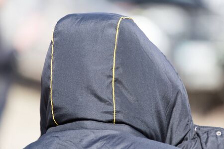 Jacket with a hood on a man