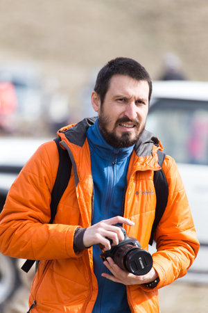 Shymkent, KAZAKHSTAN - February 26, 2017: Photographer on Russian holiday Maslenitsaのeditorial素材