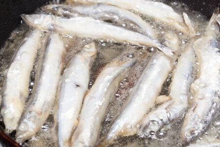 capelin in the flour fried in a panの写真素材