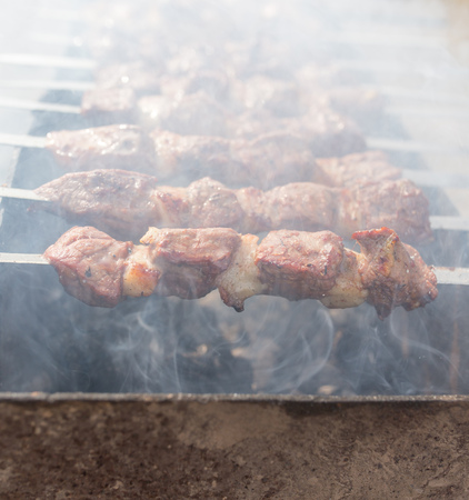Meat on the grill in the open air .の写真素材