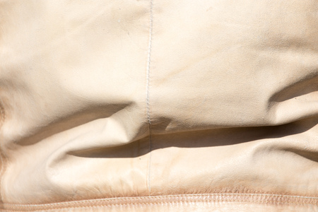 Light skin on the jacket as a backgroundの写真素材