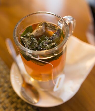 A glass of mint tea in a restaurant .の写真素材