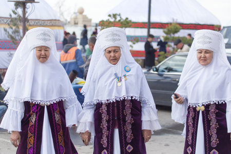 Shymkent, KAZAKHSTAN - 22 March 2017: Celebration of the Kazakh holiday NARIYZ. People in national costumesのeditorial素材