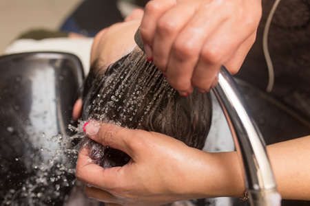 Washing of female hair in a beauty salon