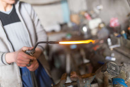 Tool gas welding worker in the workshopの写真素材