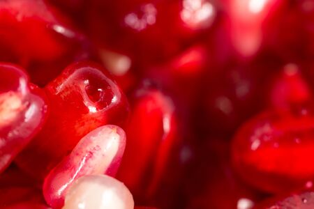 Berries juicy red pomegranate as background. macroの写真素材