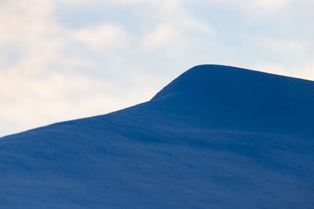Beautiful snow on nature at sunset as backgroundの写真素材
