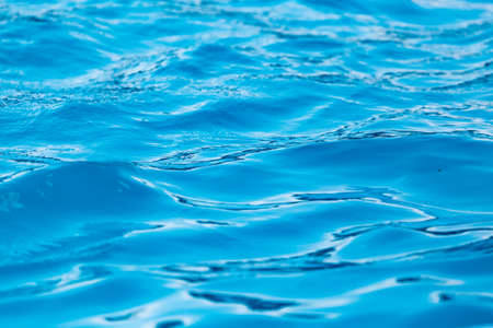The smooth water in the pool as a background .の写真素材