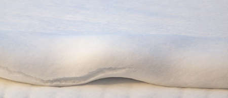 Beautiful snow on nature at sunset as backgroundの写真素材