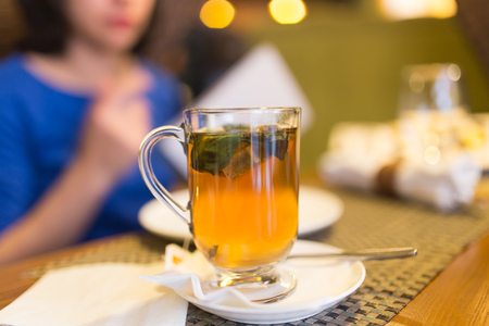 A glass of mint tea in a restaurant .の写真素材