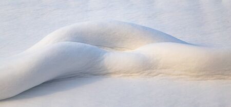 Beautiful snow on nature at sunset as backgroundの写真素材
