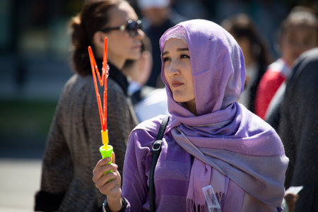 Shymkent, KAZAKHSTAN - May 1, 2017: People in national costumes on the Day of Unity of the People of...