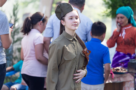 Shymkent, KAZAKHSTAN - May 9, 2017: Girl soldier. The feast of the victory of the Red Army and Soviet people in the Great Patriotic War of 1941-1945.のeditorial素材