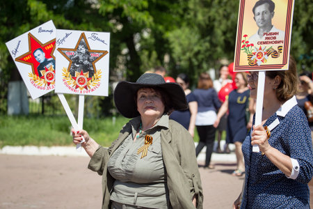 Shymkent, KAZAKHSTAN - May 9, 2017: Immortal regiment. Folk festivals of people. The feast of the victory of the Red Army and Soviet people in the Great Patriotic War of 1941-1945.のeditorial素材