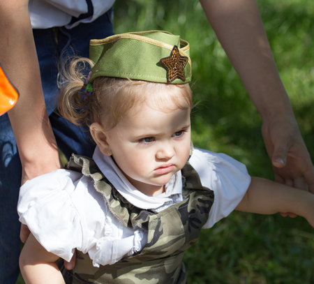 SHYMKENT, KAZAKHSTAN - MAY 9, 2017: A girl at the Victory Day of the Red Army and Soviet people in the Great Patriotic War of 1941-1945.のeditorial素材