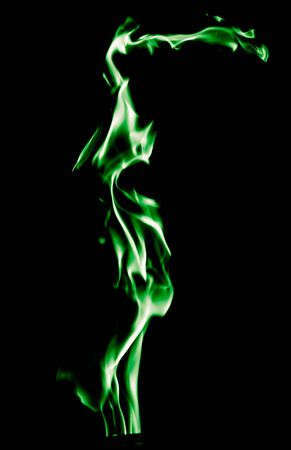 Green flame of fire on a black background .の写真素材
