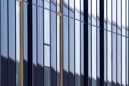Mirror windows of a building as a background .
