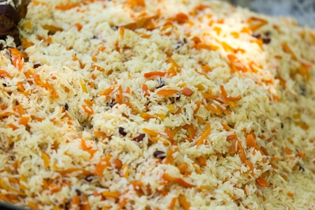 A dish of rice pilaf as a background .の写真素材