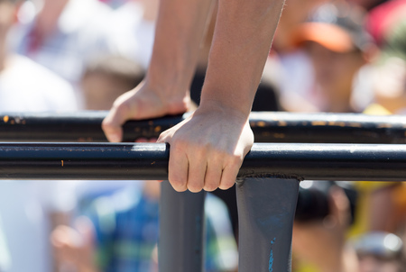 Strong hands on the bar in training .の写真素材