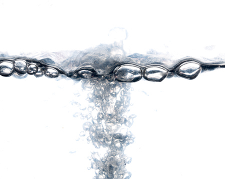 Water with bubbles on a white background .
