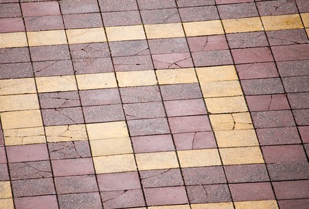 Paving stone on the road as a background .