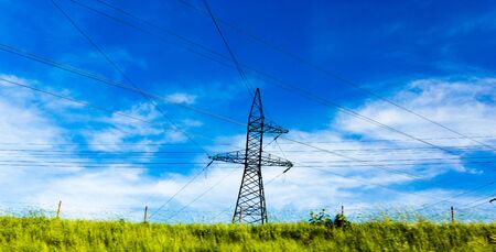 Electric pole with wires on spring nature