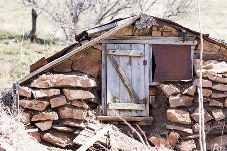 The ruins of an old house in nature .の写真素材