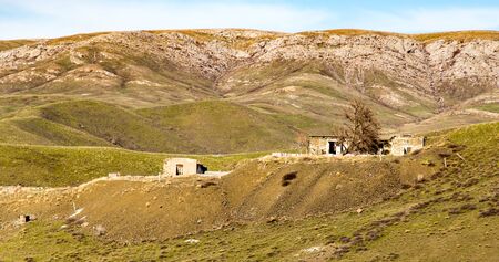 The ruins of an old house in nature .の写真素材