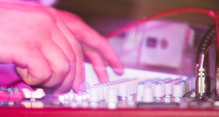 The tuner adjusts in the music console .の写真素材