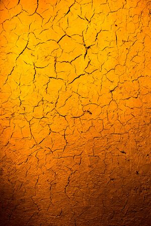 Clay wall in golden light as background .の写真素材