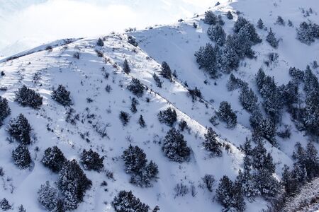 Snowy mountains of Tien Shan in winter .