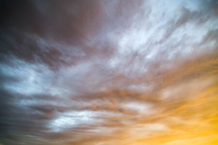 Background of beautiful rain clouds at sunset